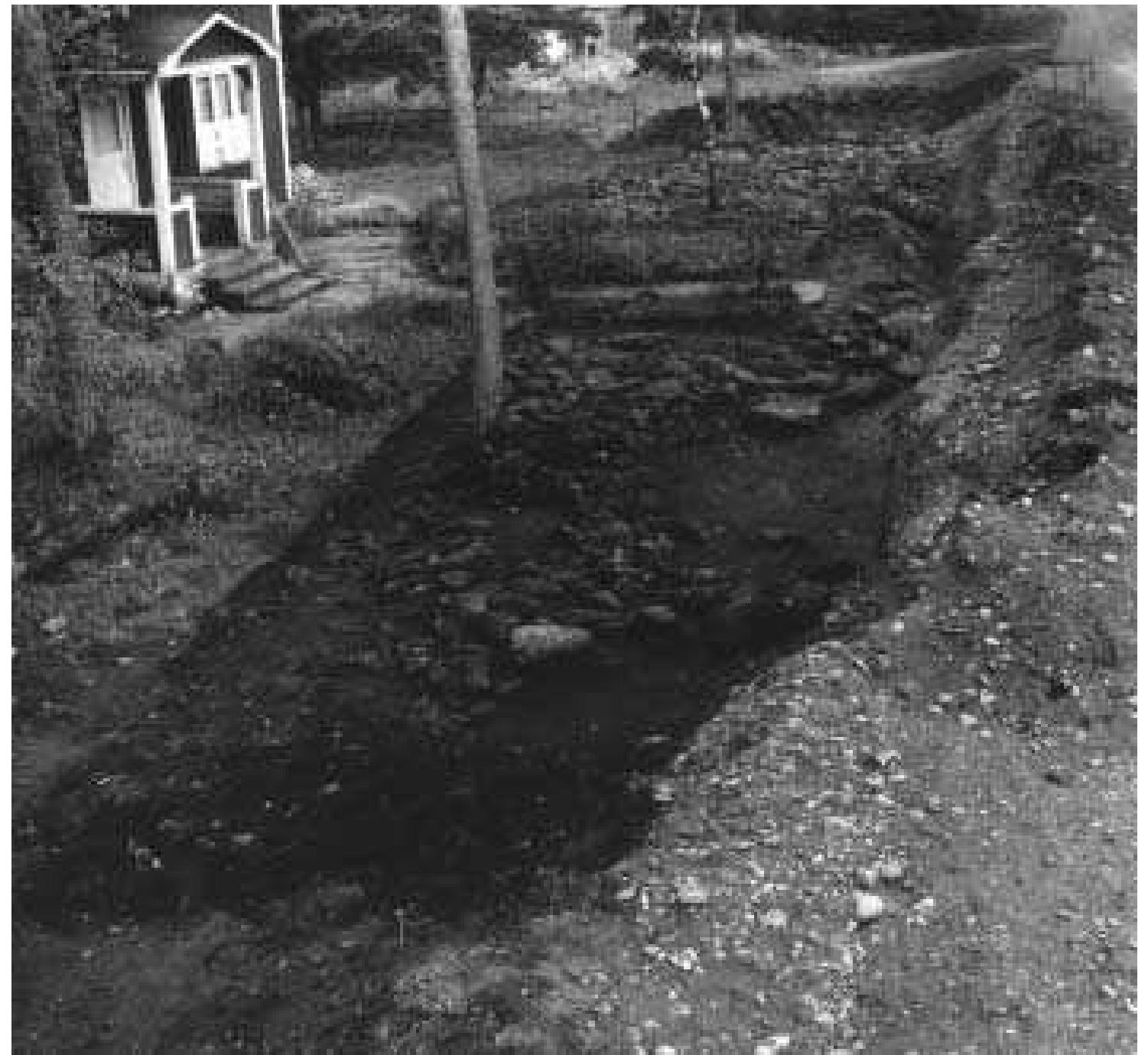 Fig. 3:9 The excavations of 1961 at the Rojrhage |:1 property in cemetery section 2, seen by a photographer standing at the southern end of the trench. Bhr 1961:15 in the foreground. Photograph by Peter Manneke 1961 (ATA).  The documentation from Manneke’s Barshalder excavations  1960-61 is presented as a 45-page typed A4 report dated  3.1.34.1 The documentation 