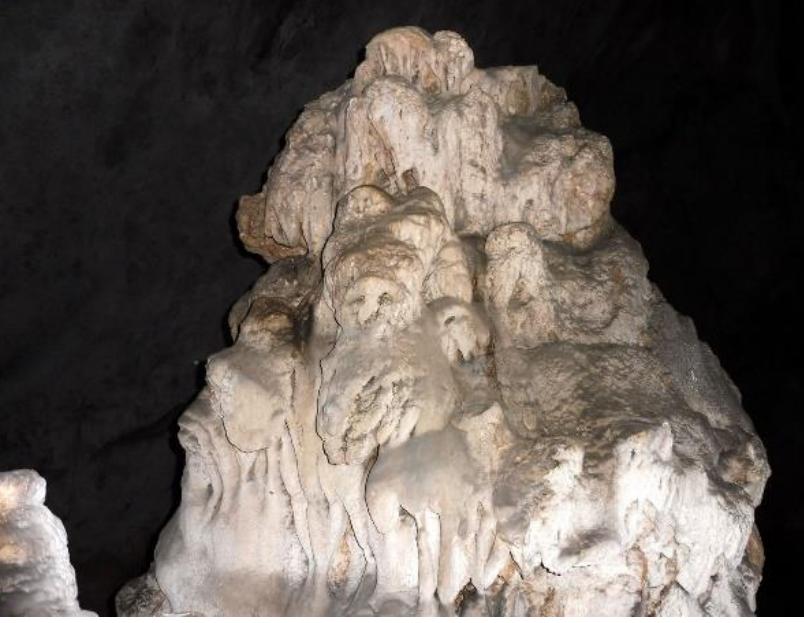 SILULLENLS OULU VIEW OF LILE SKY UY U VELL OF pleached and intertwining branches, then the loftiness of the forest, the mysterious- ness of the place [secretum loci], and your marvel at the thick unbroken shade in the midst of the open landscape, will prove to you the presence of the numinous [numi- nis]. Or if a cave, made by the deep crum- bling of the rocks, holds up a mountain on its arch, a place not built with hands but hollowed out into such spaciousness by forces of nature, your soul will be deeply moved by a certain intimation of the exist- ence of the divine [religionis suspicione percutiet/, We worship the sources of mighty rivers; we erect altars at places where great streams burst suddenly from hidden sources; we adore springs of hot water as divine, and consecrate certain pools because of their dark waters or their immeasurable denth’’ []3]. 