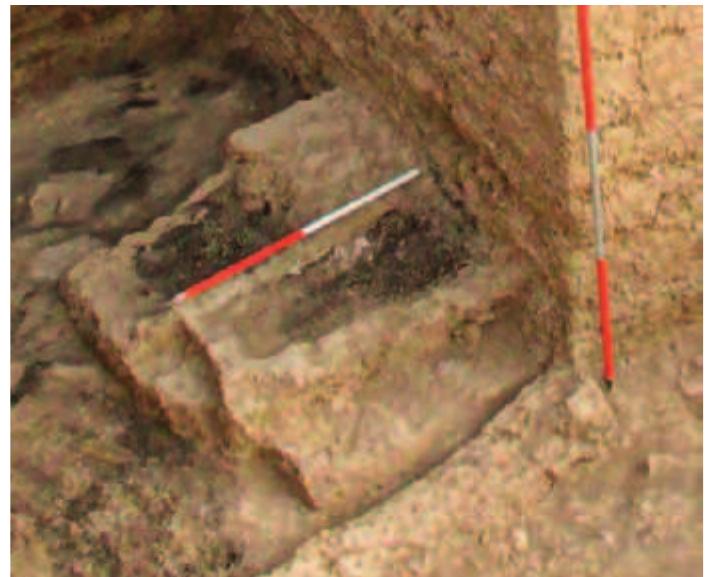 Fig. 34. The fire installation south of the altar in Room 1. 