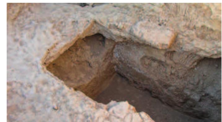 Fig. 54. Room 4, showing the east wall of Room 4 below the high level floor. 