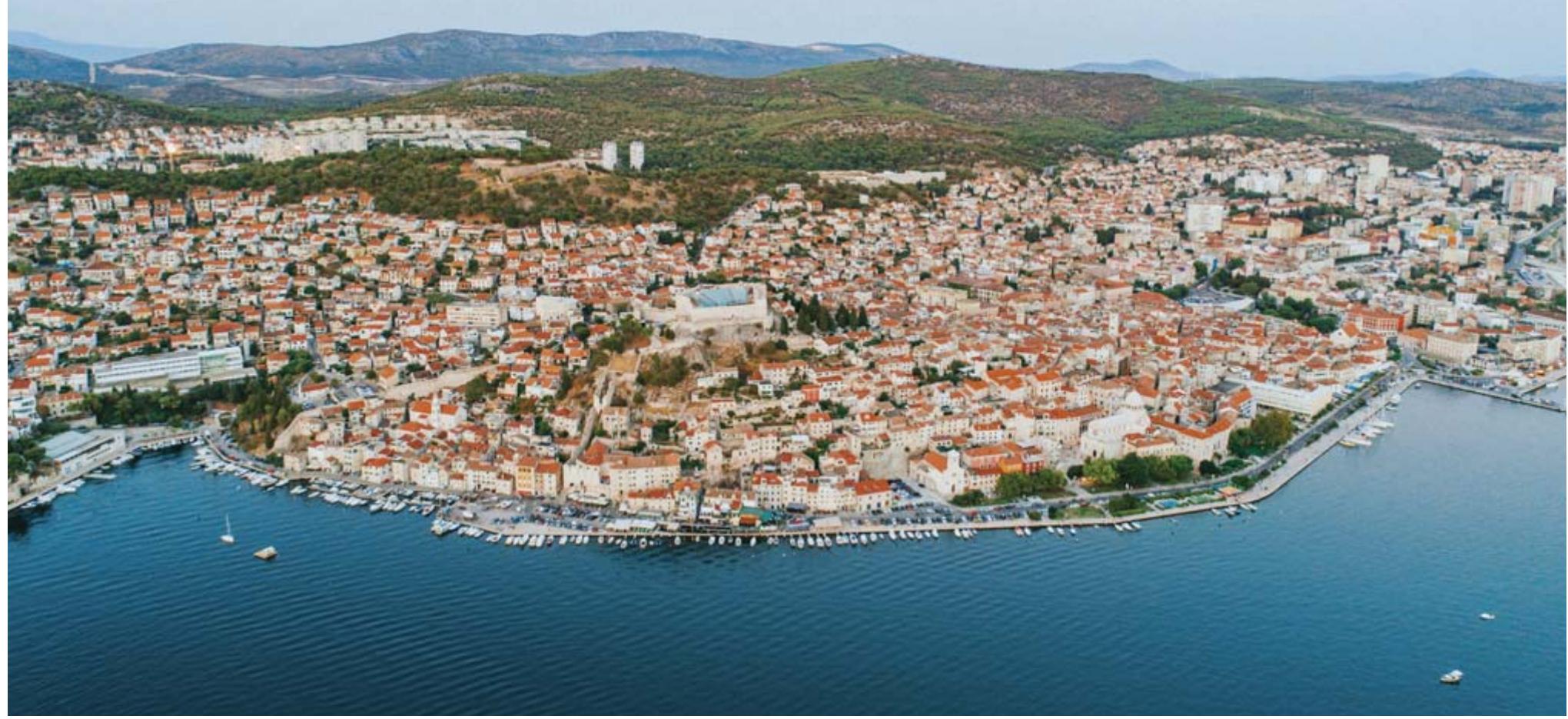 1/ Aerial photo of Sibenik city centre with St. Michael’s castle (fortress) in the forefront, St. John’s Fortress and Barone Fortress are in the background (2017, Fortress of Culture Sibenik).  St. Nicholas Fortress (fig. 2) is a typical example of 16" century Venetian fortification architecture’. It was con- structed to defend the outer entrance to St. Anthony’s Channel, primarily because of the increased power of the Ottoman navy in the wake of Third Venetian-Ottoman War (1537-1540). The fortress was built on the site of Benedictine monastery of St. Nicholas, which was before to the construction’. The fortress design and construction is the work of the renowned Sanmichelis, the Veronese family of architects, build- ers and sculptors. Their finest artist, Michele, has been the head supervisor of all Venetian fortifications since 1535, dealing with their construction, renova-  After the completion of works on the restoration of medieval St. Michael’s castle in the early summer of 2014°, the interdisciplinary (conservation-restora- tion, archival, archaeological) analysis of Sibenik Early Modern fortifications began with the research and restora- tion of Barone Fortress in the late au- tumn of 2014, and continued during the revitalization project of St. John’s For- tress (2016-2022). Both 17 century fortresses gained new functions after these projects. Meanwhile, in July 2017, St. Nicholas Fortress was inscribed on UNESCO World Heritage List, and in- terventions on this monument became particularly delicate. This paper covers   The first major intervention was the construction of the maritime St. Nich- olas Fortress on the western end of St. Anthony’s Channel, which secured the naval access to Sibenik harbour and the city centre of Sibenik. The comprehen- sive modernization of Sibenik land de- fence system was carried out only in the mid-17" century, under the pressure of the events in War of Candia (1645-1669). The new system was hastily formed at the  