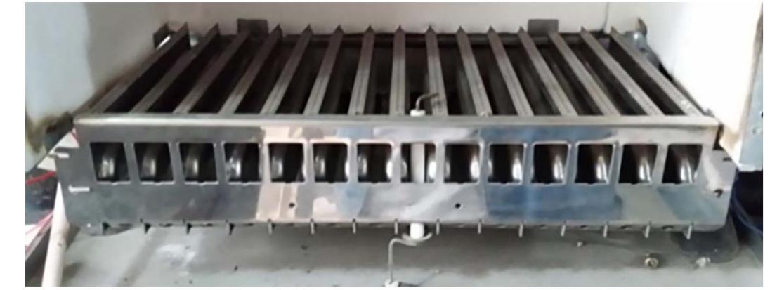 (PDF) Design of a partially premixed burner for biogas-fired wall ...