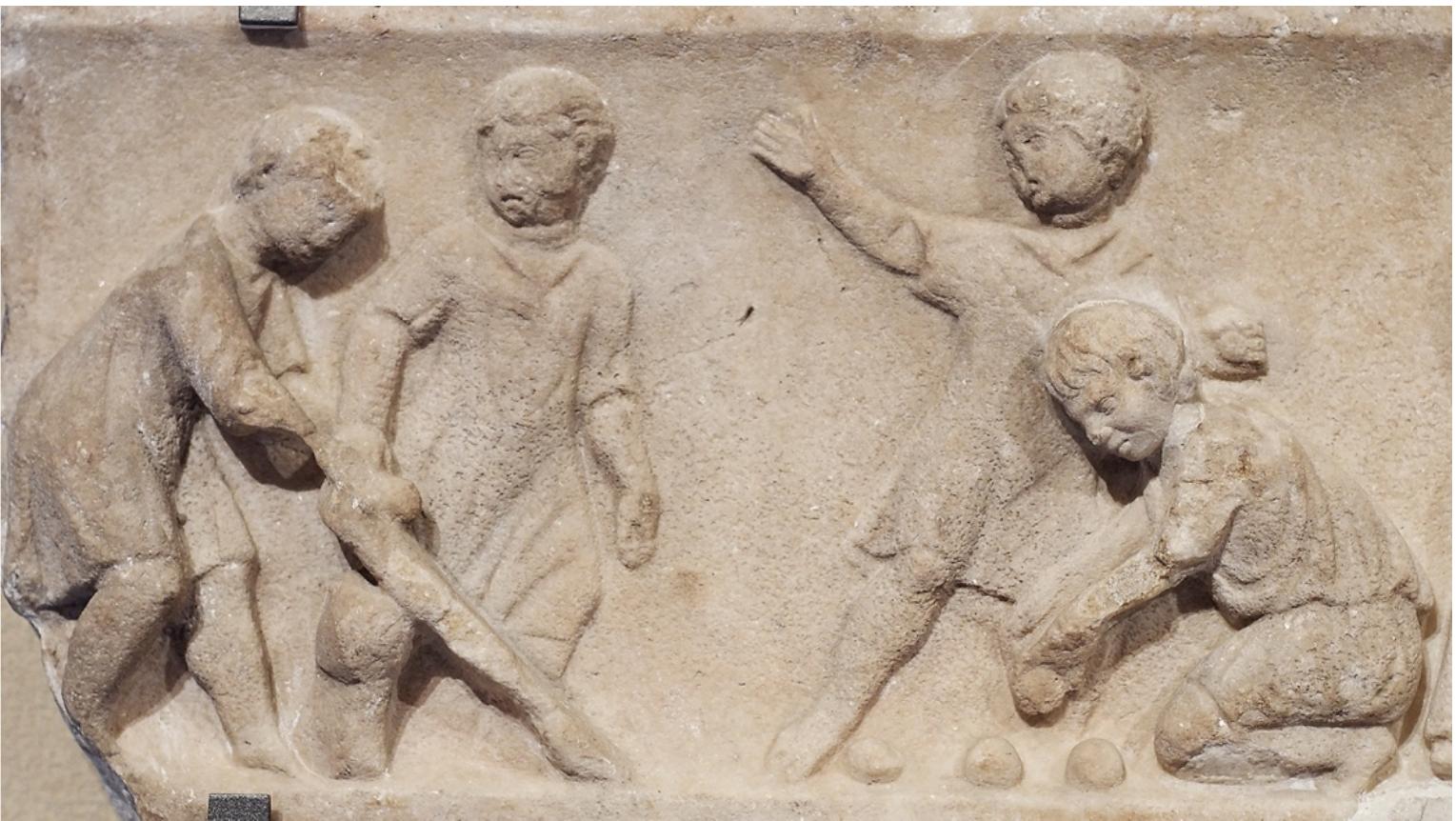 Figure 2: Detail of late 2*-century sarcophagus showing children playing a ball game with the aid of an inclined slope. Musée du Louvre, Département des Antiquités grecques, étrusques et romaines, Cp 6467; Ma 99. Courtesy of Marie-Lan Nguyen via Wikicommons (CC BY 3.0). 