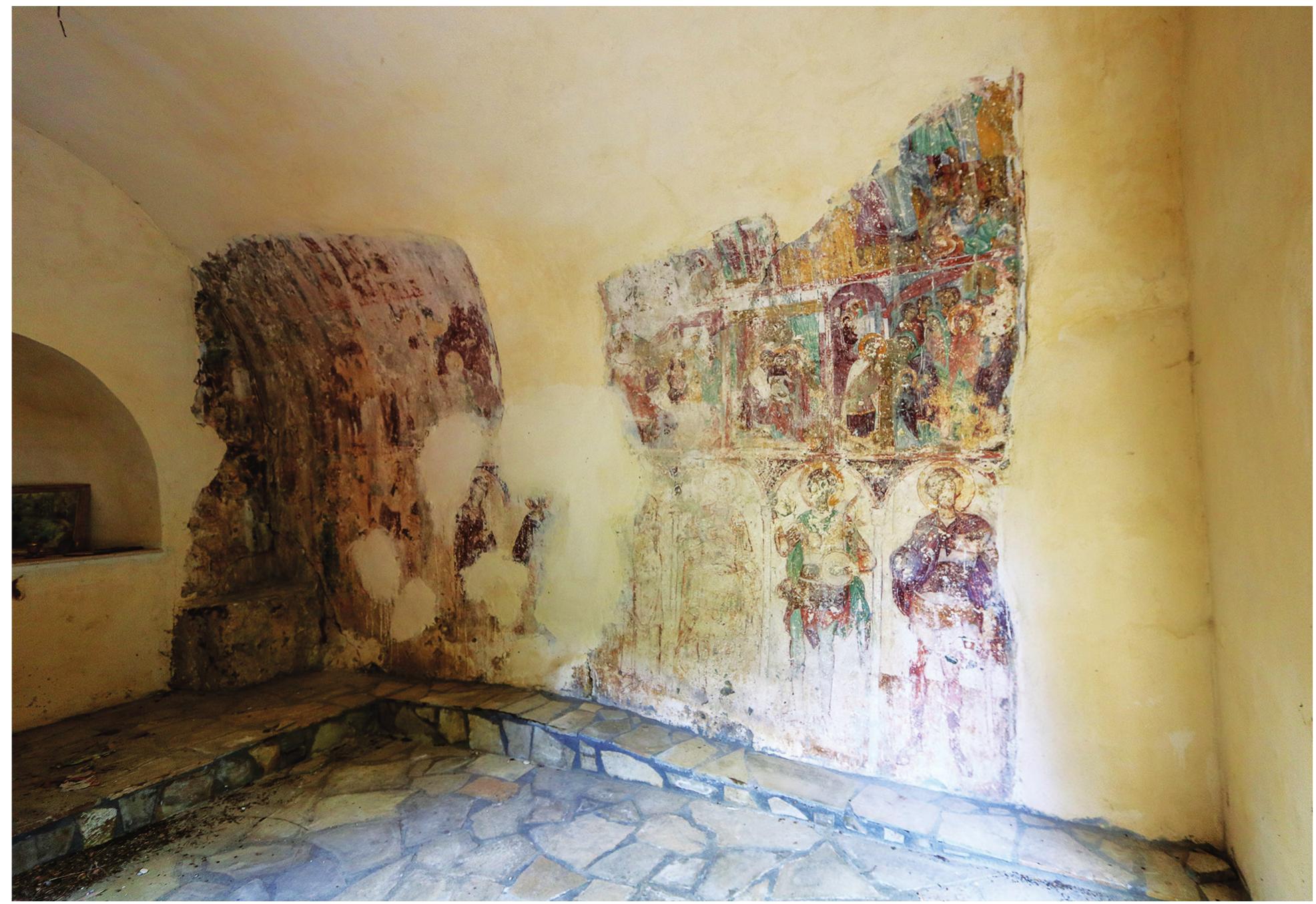 Fig. 10. Church of Panagia, Kato Symi, surviving frescoes on the eastern and southern wall. Photo by authors. 