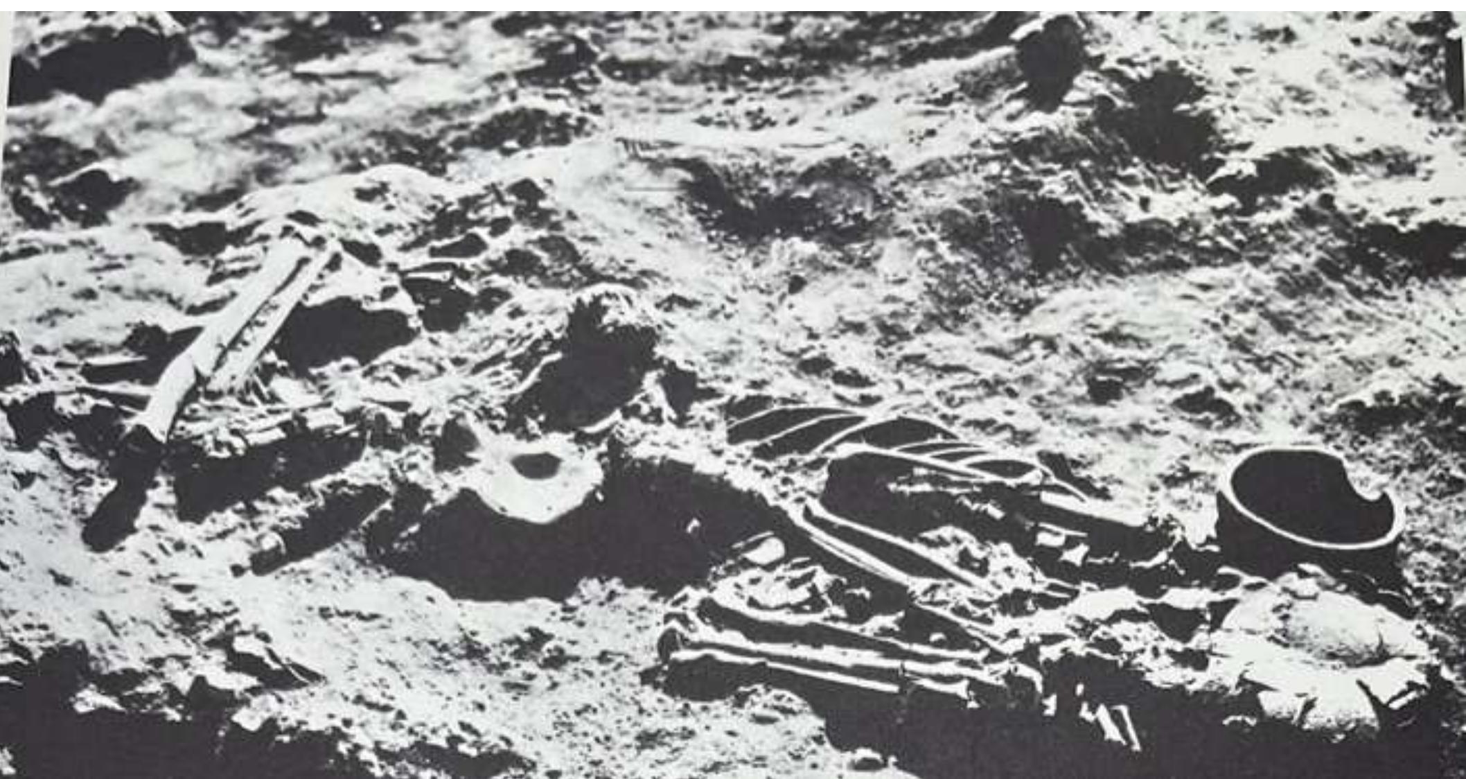 Figure 20:  During the Middle Neolithic, similar to the earliest settlement, various types of graves were discovered, including those dug in the ground with no visible containers, stone cradle burials, and pottery jar burials. However, their proportional distribution is not uniform.  Single burial 1736 with a grave dug in the soil, the individual is buried laying on his left side, hyperflexed with no visible container bu associated with pottery grave goods (courtesy to Dunand, 1973: Pl. XL - 1). 