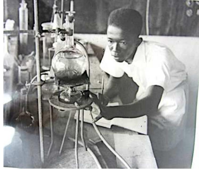 Figure 10 Student Adi-Pratt is seen conducting an experiment  Figures 9 and 10 above were taken in 1946 by an agent of the West African Photographic 