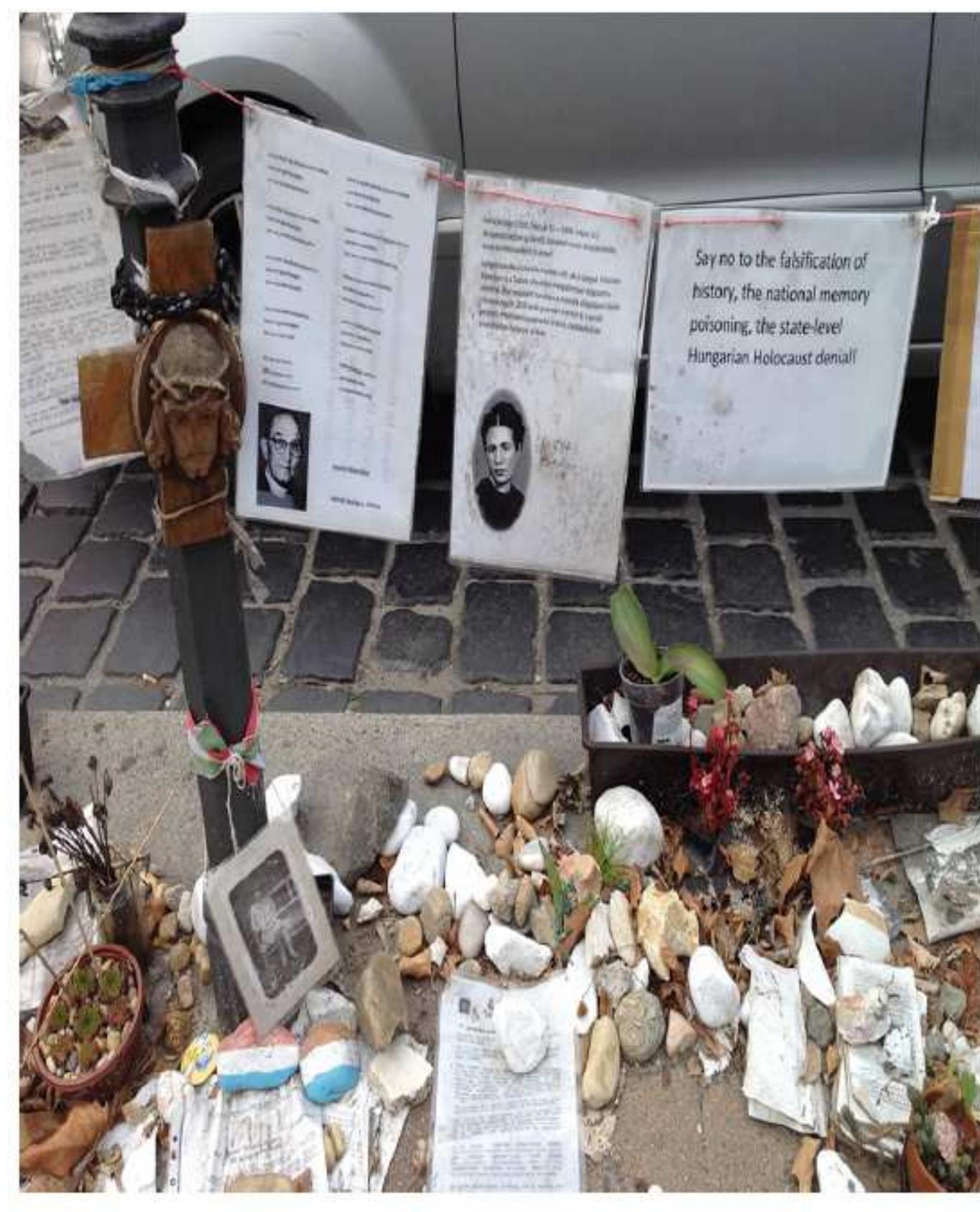 Figure 36.2. The Living Memorial. October 2014. Photo by Anna Menyhert.  To counter this state-enforced interpretation of the past, a group of protesters assembled a counter-monument intended to commemorate not  state victimhood but actual victims who were deported as a consequence of 