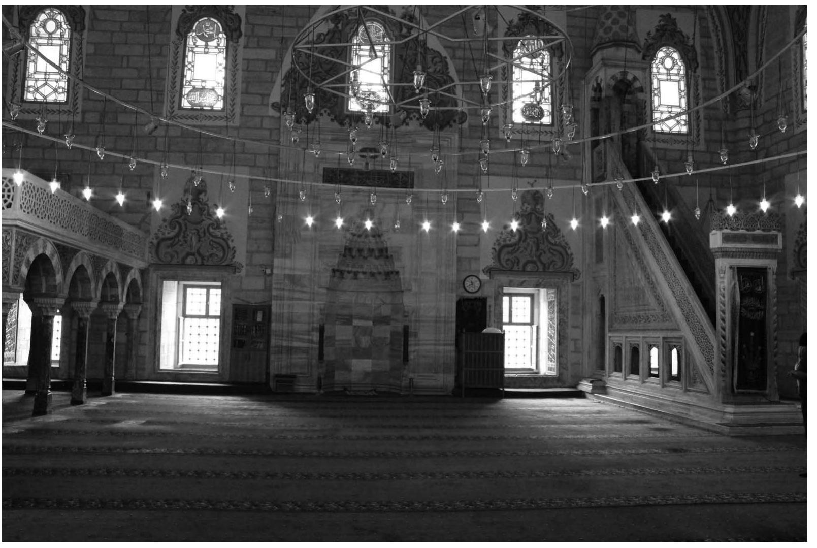 Figure 2.1.3 View toward mihrab, mosque-zdviye of Bayezid II, Edirne, Turkey, 1484-88. Artwork in the public domain, photograph by the author.  The objects’ scale may also have to do with the placement of the Ottoman examples, and the fact that these candlesticks were used in pairs, whereas larger numbers are documented for Mamluk endowments. We can further reflect on this question since the buildings in Edirne (see Figure 2.1.3) and Amasya, for which the objects of this study were made, sur- vive today. In 1485, Bayezid II commissioned the construction of a complex in Amasya, a city in northern Anatolia that was central to the traditions of Ottoman rule, as princes 
