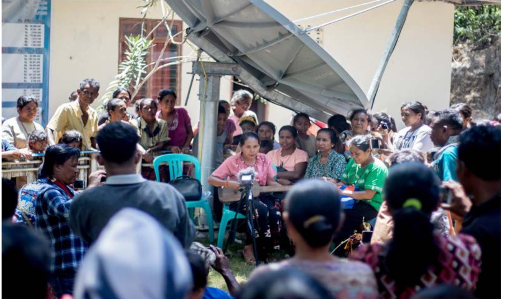 Figure 1. Ata Ratu, a well known Marapu folk singer performing at an event facilitated during Phase One of the Li  Figure 1. Ata Ratu, a well known Marapu folk singer performing at an event facilitated during Phase One of the L Marapu project. This activity documented traditional musics and surveyed Marapu intangible cultural assets of Mbatakapidu and its surrounding villages. Photo: Joseph Lamont, Mbatakapidu Village, East Sumba. October,  9019.  become the second and larger phase of the project Lii Marapu.  The first phase of Lii Marapu (2019-2021) was led by NGO Sumba Integrated Development (SID) (see Figure 1). Titled Revitalising Marapu Cultural Assets, this phase aimed to support East Sumbanese Marapu communities to document, archive, revitalise, disseminate and celebrate their intangible cultural assets, including music, songs, ritual practices and oral traditions (Grant et al. 2021:4). Although Revitalising Marapu Cultural Assets was self- contained and generated cultural assets and educational outcomes that stand in their own  right, these assets and outcomes also formed a necessary resource base for what was to later  right, these assets and outcomes also formed a necessary resource base for what was to later 