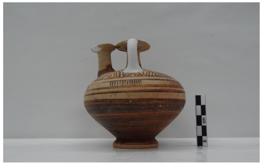 Fig. 75. 1114212/11185 stirrup jar from Ag. Georgios of Persaina. 