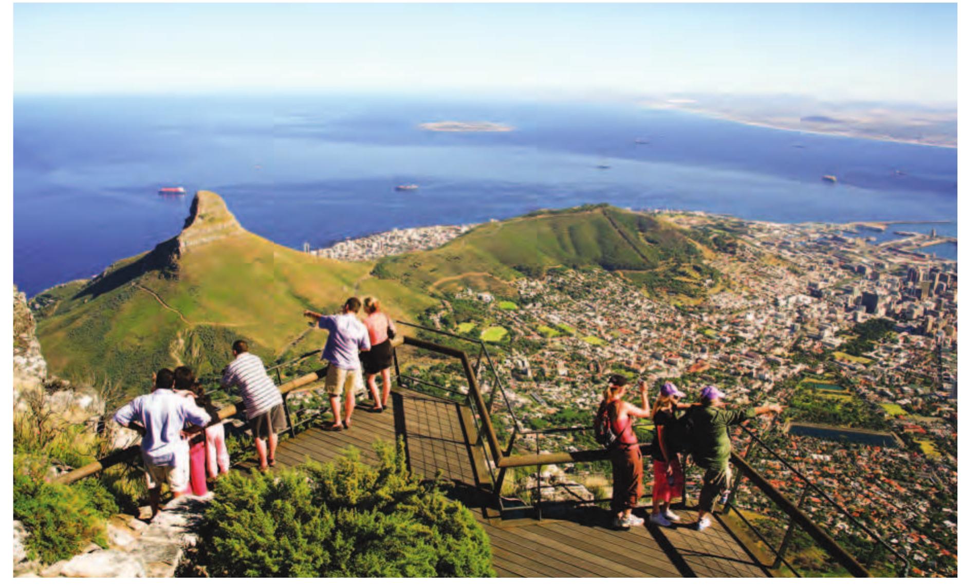 Tourists viewing the  city from the summit of Table Mountain. 
