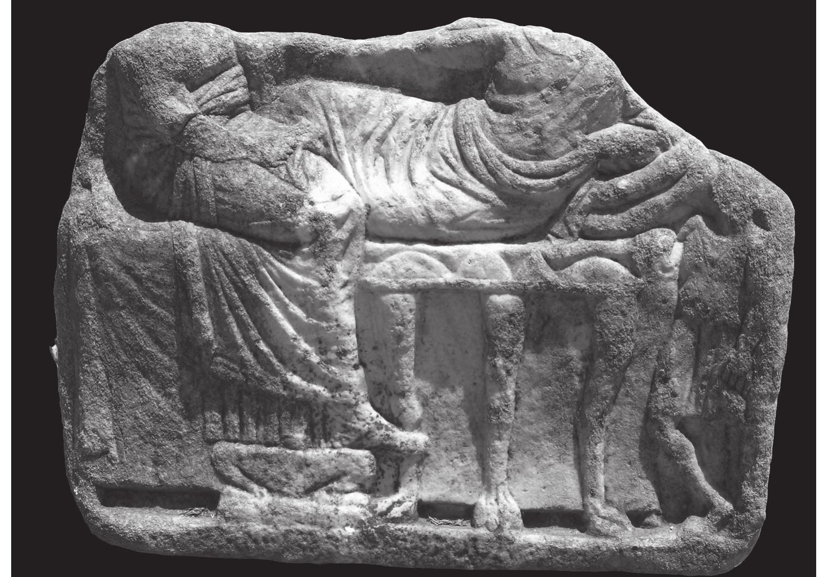 Figure 3. Banquet relief in the Neratzia Castle, Kos (© Ministry of Culture and Sports/Ephorate of Antiquities of Dodecanese/Archaeological Receipts Fund). 