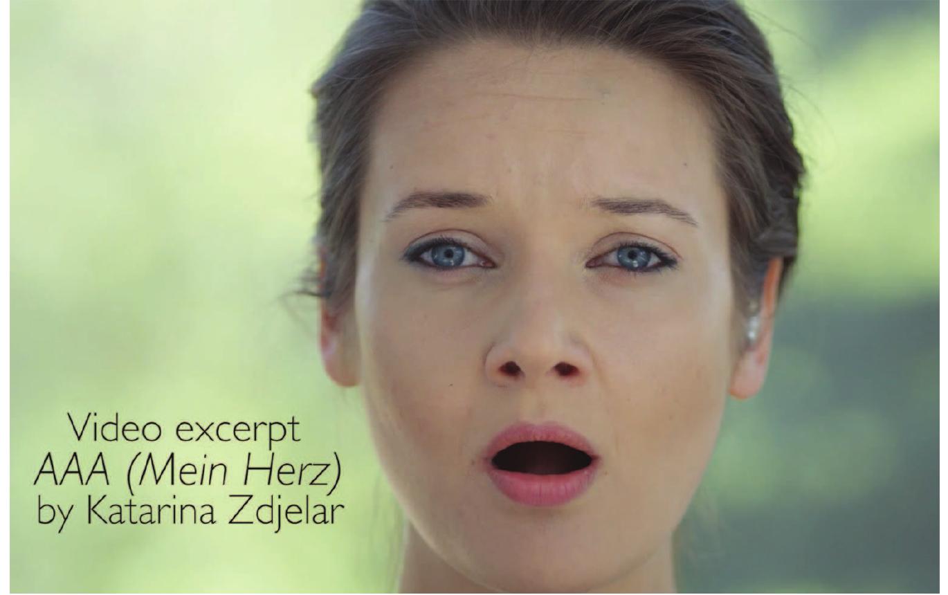 Image 4: Barbara Kinga Majewska in Katarina Zdjelar’s, AAA (Mein Herz) video still  live music-theatre experience performed on several occasions. At different times the installation performs an ‘intervention’ in the exhibition with three short compositions, referring to the elements in an opera: there is an aria, “Beauty 3.2 Volts”; a duet, “Diva and the Beast”; and a female quartet, ‘Oph- elia. The ‘voices’ we hear are invoked by the objects on the display - two groups of power adapters and a Velicon. 