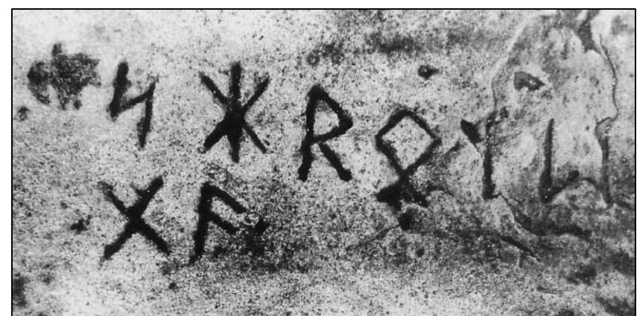 Figure 56. The Narragansett Rune Stone inscription. Malcolm Pearson, photographer. Image sourced from William F. McNeil, Visitors to Ancient America: The Evidence for  European and Asian Presence in America Prior to Columbus (Jefferson, NC: McFarland & Company, Inc., 2005.), 73.  Figure 57. This diagram illustrates the simplicity of the Ogdoad-rune. Medieval calendars used Latin letters, A through G, to denote the 7 days in a week. The Latin G in calendars cross-correlates  to the gyfu rune (X). The addition of the tallymark to the gyfu-rune incremented the value of the new symbol to a count of 8, forming the Ogdoad-rune. 