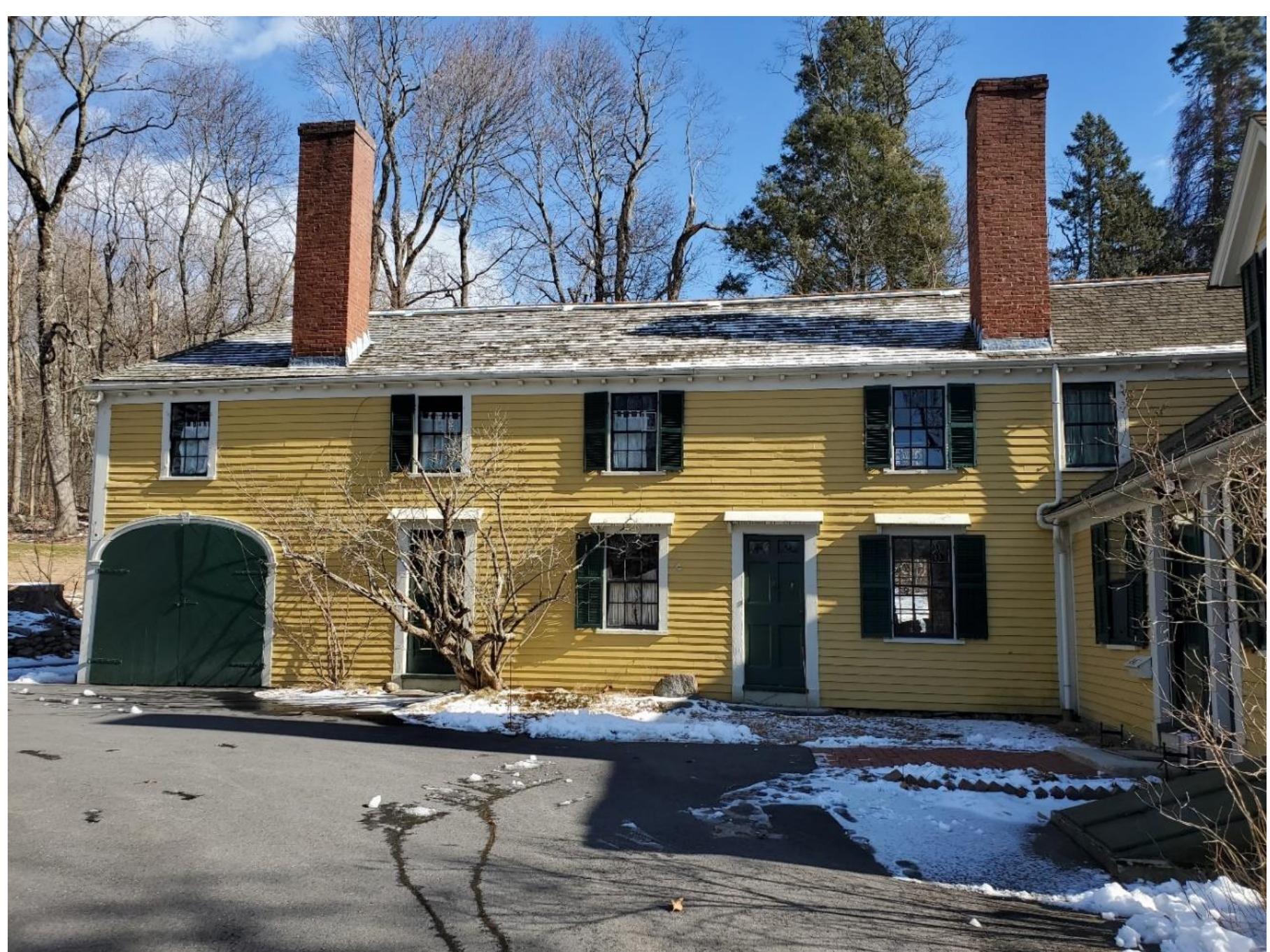 Figure 18. The Elisha Jones shed currently attached to the original house. The bullet strike is to the immediate right of the window in the center of the image. 