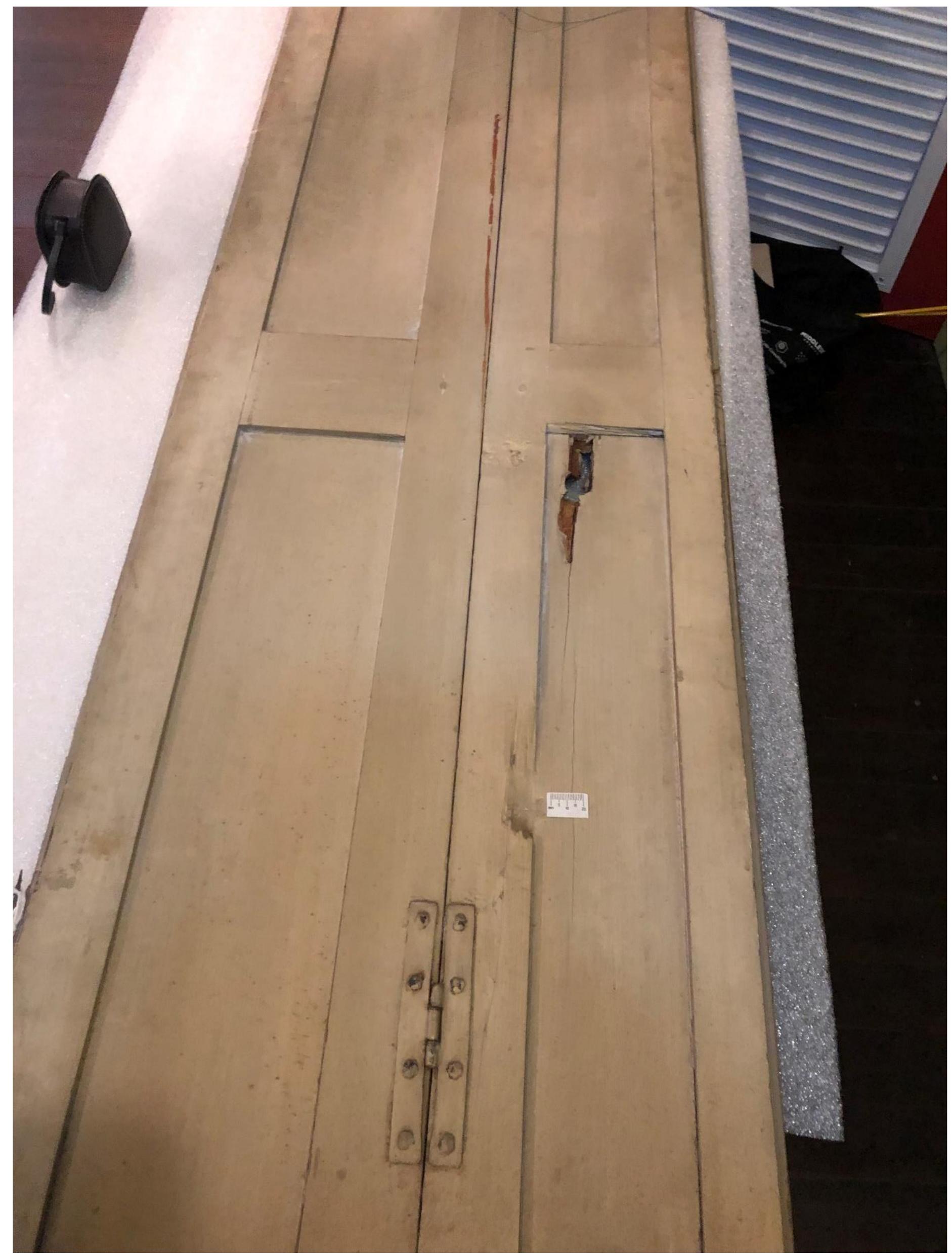 Figure 28. Bullet-struck interior shutters removed from their original context and now part of th Arlington Historical Society collection. 