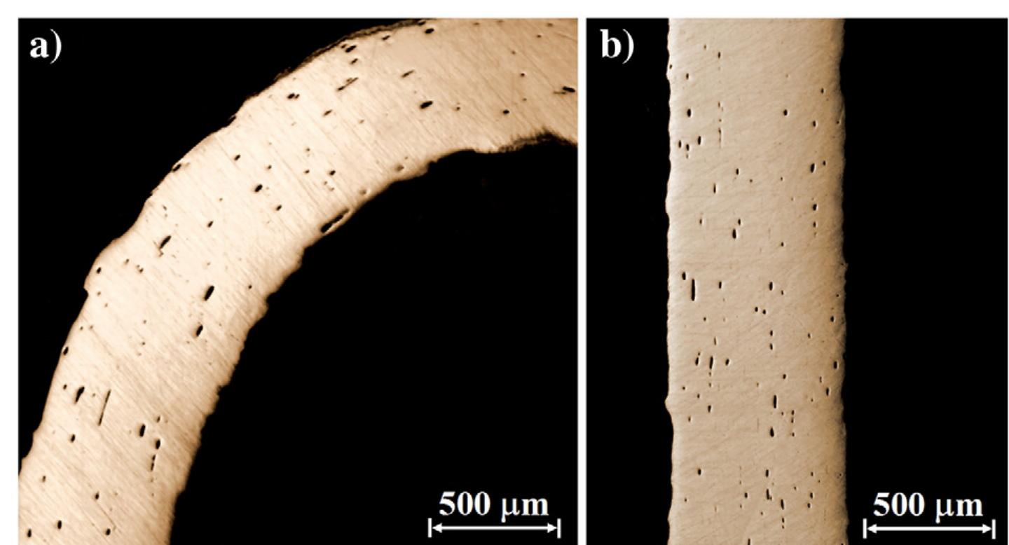 Fig. 11 - Optical microscopy examination of the brass hook-and-eye closures (L-CS, before etching) revealed presence of elongated inclusions oriented in the direction of the cold-working process: (a) metallographic sample H7 (eye, curved part), and (b) metallographic sample H10 (hook, straight part).