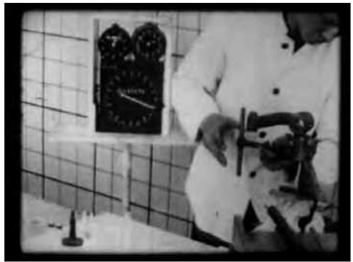 The grid is ostensibly designed for easy measurement of worker movements;  the factory floor the “conditions” of a job — especially the lighting conditions — were not easily filmed, so Gilbreth built a “Betterment Room” on the site, speci- fically constructed so that worker motions could be filmed. The worker and his or her working area or machine were brought from the factory floor and set up in the room; Gilbreth continued to use this approach for all his films. Two ele- ments of the “mise-en-scene” of these films are noteworthy. First, we see that each worker and his or her station is placed against a white background with a four-inch grid pattern. 
