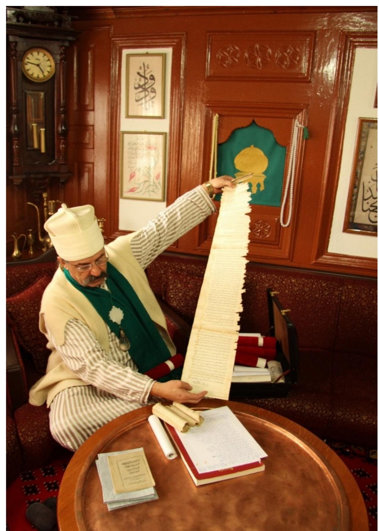 Fig. 4: Sa‘di Shejh Ruzhdi Shehu displays his ijaza, Teqja e Sheh Eminit ir Gjakova, Kosovo. Photo © Sara Kuehn, 2012 