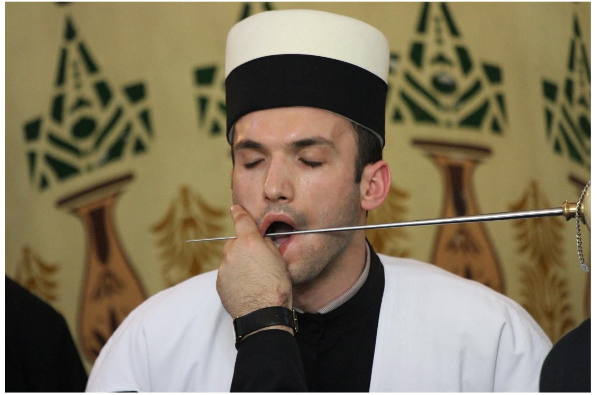 Fig. 7: Darb al-silah during the Ashura zikr, Teqeja e Haxhi Shejh Iljazit in Rahovac, western Kosovo. Photo © Sara Kuehn, 2013 