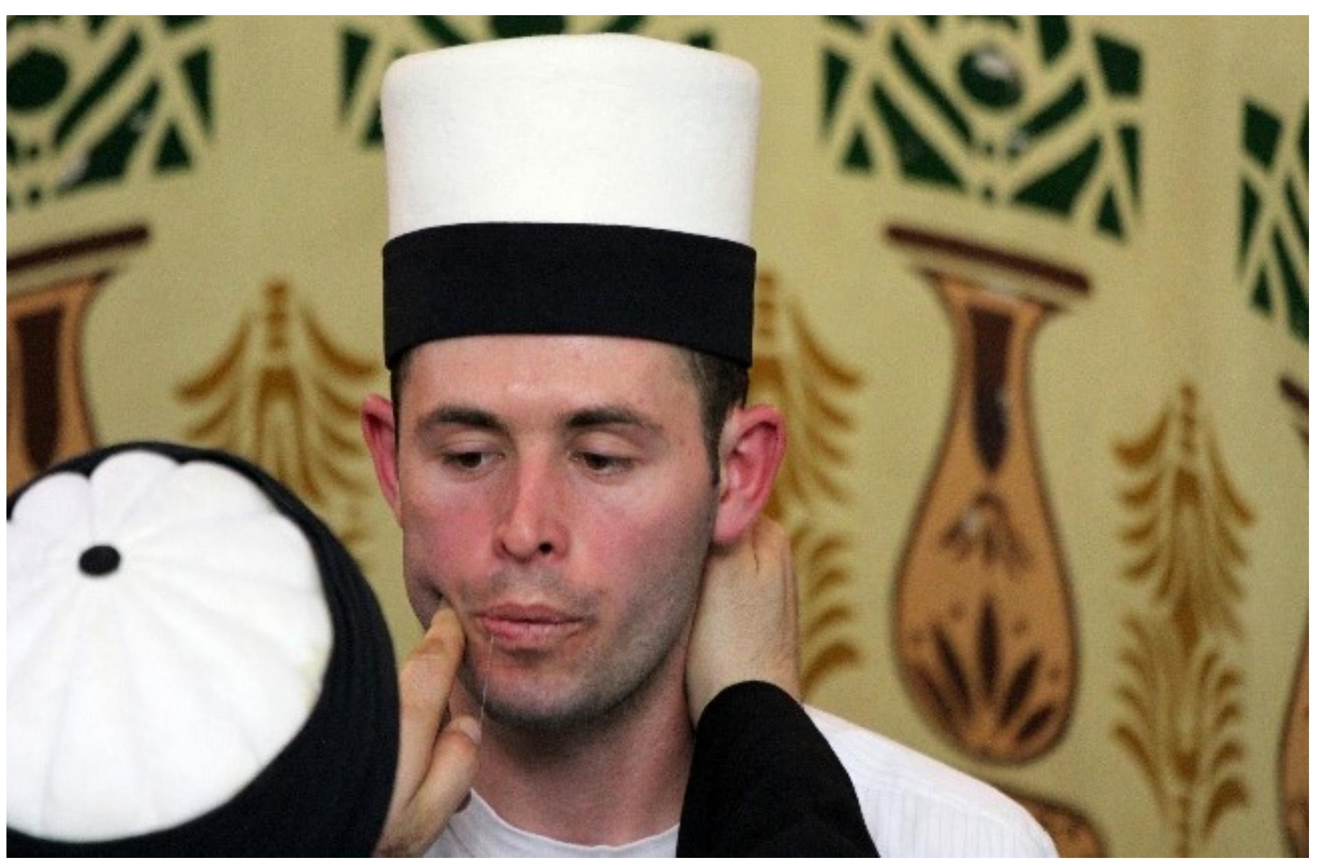 Fig. 9: Darb al-silah during the Ashura zikr, Tegeja e Haxhi Shejh Iljazit in Rahovac, western Kosovo. Photo © Sara Kuehn, 2013. 