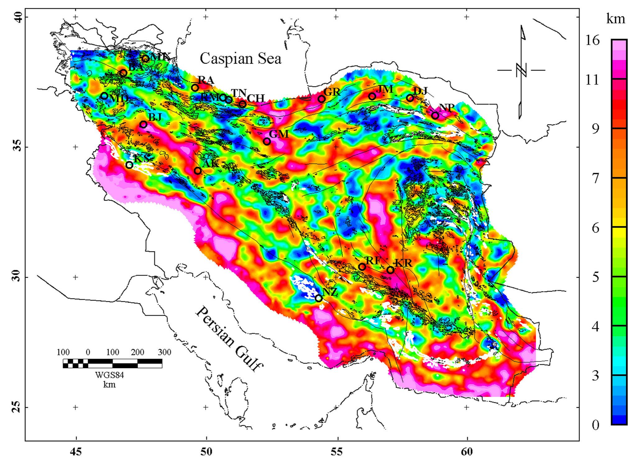 Figure 8. Map of the depth to the magnetic basement of Iran. The depths are relative to the surface. The surface trace of active faults is shown by solid thick black lines (after Hessami et a/. 2003). The surface outcrops of volcanic units and ophiolites are shown by thin black and white lines, respectively. The borders of the geological units shown in the above figure and all later figures are from 1:1000,000 Geological map of Iran published by Geological survey of Iran. The circles are the locations of cities named in the text. The abbreviations are as follows: AK, Arak; BA, Bostan Abad; BJ, Bijar; CH, Chalus; DJ, Dastjerd; GM, Garmsar; GR, Gorgan; JM, Jajarm; KR, Kerman; KS, Kermanshah; MD, Miandoab; MK, Meshkin Shahr; NZ, Neyriz; RA, Rasht; RF, Rafsanjan; RM, Ramsar; TN, Tonekabon. 