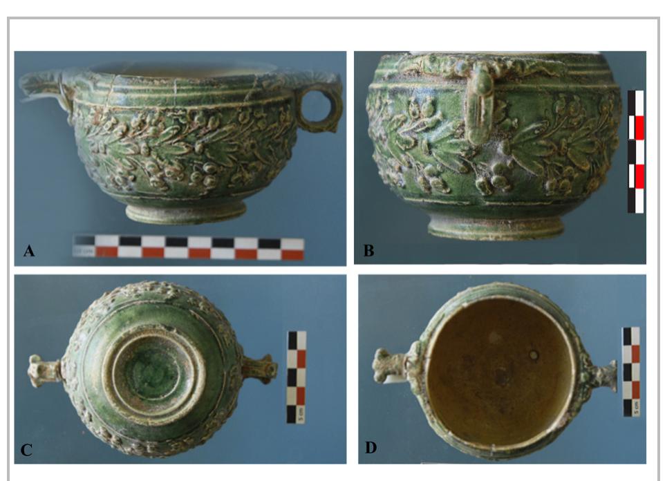 Fig. 26- The moulded lead-glazed pottery skyphos of Mazraa 571. Photographs: A) front view, B) side view, C) base view, D) top view. 