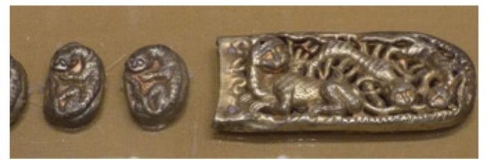Figure 5. Belt buckle, Olen’ Kolodez’ burial no.7. Mid-thirteenth century. Embossed and gilded silver. 