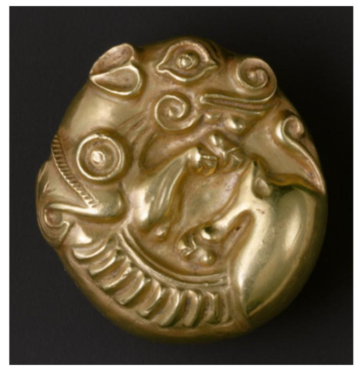 Figure 6. Pommel with coined animals. Scythian period. 