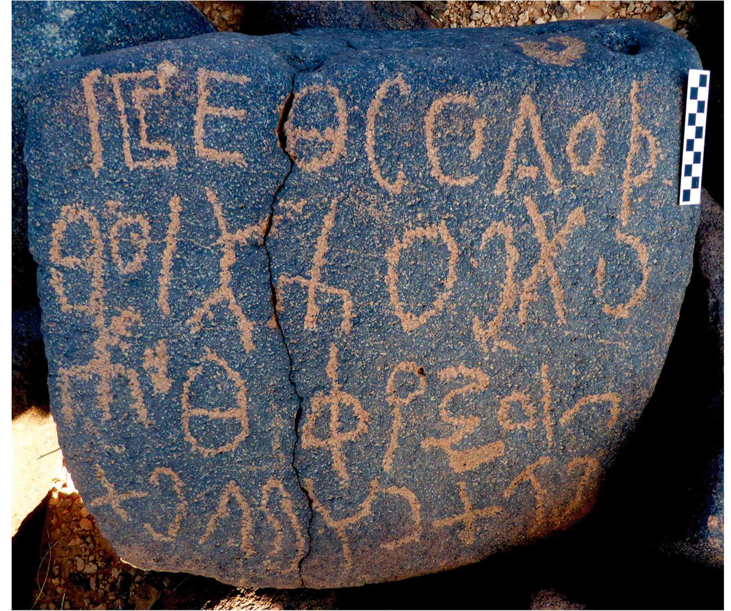 Figure 4 The Safaitic inscription Saf 1 (photograph: © Al-Manaser 2018; OCIANA project).  this assumption, so we should wait until further evi- dence emerges to further explore this possibility.  As is the norm in Safaitic, the inscription begins with the /am auctoris introductory particle followed by a lineage chain (see Al-Jallad 2015a: 57). Here, he author has identified himself by tracing three gen- erations of his genealogy and indicating the name of his tribal group, the lineage of ‘Awidh (‘wd), which is one of the two main tribal groups of nomads iving in the Harrah during the Roman period Harding 1969: 20; Al-Rusan 1987: 339-41; Graf 989: 361-63; Macdonald 1993: 354-65; Al-Jallad and Bernard 2021: 75-77). The three persona names are already attested. The author’s name, Mhwr, is quite rare in the Harrah, considering tha it occurs in only 7 other Safaitic inscriptions of the OCIANA corpus. The situation differs with respec to Hrg and S‘‘d which are respectively attested 82 and 700 times in Safaitic (see OCIANA). But the main point of interest is that the individual Mhwr, son of S'‘d son of Hrg, is already known from two other Safaitic inscriptions that he left at other sites in the Harrah: the first is SIJ 206 which comes from Jathtm, 45 km west from the site of Saf 1, and the second is WH 966 which was rediscovered and photographed by the BES team in 2018 on a site located 17 km north of Saf 1 (Fig. 5). It is also worth mentioning that, although rare, the name Mhwr is shared by another ‘wd tribesman, Mhwr son of Gtfn son ‘dnt (C 4448), and that there are  —  