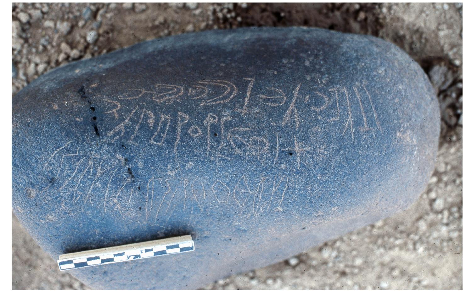 It starts right-to-left on the upper line and then continues left-to-right on the lower one. 