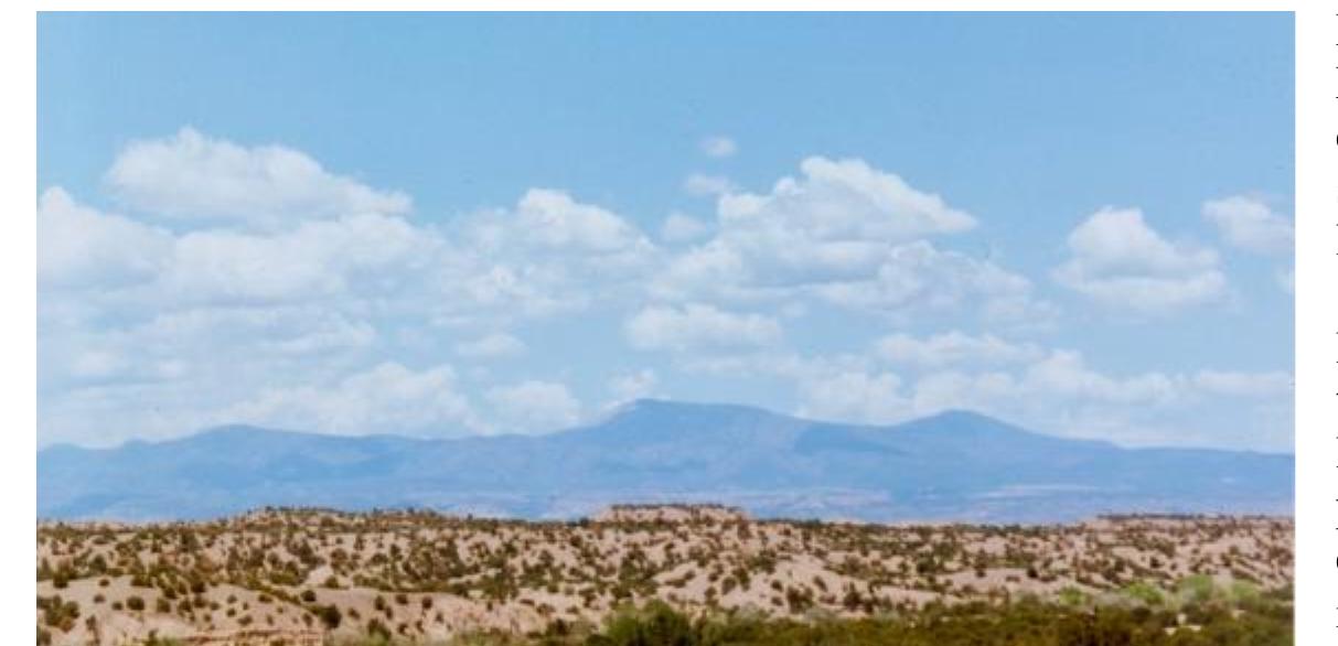 mesas rest on the distant horizon. The sound of insects reverberates as the sun’s heat shimmers off the baked ground.  King is an artist, writer, and poet whose work is concerned with issues of place and displacement. She lived for many years in America and Australia, and now once again lives in England. Her artwork can be seen at: https:/Awww.victoria-king.com. vkblack- stone @ gmail.com. Photographic captions are provided on p. 27. Text and images © 2024 Victoria King.   A vision of a mud brick eventually led her to La Portales Mesa in Cuba, New Mexico, where she single-handedly built an adobe dwelling. She stopped painting for seven years and literally created a new life for herself on the land. It was an im- portant turning pointin her life and in her art. When she started working again, her artwork consisted only of hand-drawn par- allel lines and grids. It was a discipline, she said, that kept her mind focused.  This remarkable place touches all the senses. Paul Cezanne once said that a suc- cessful painting should contain within it- self even the smell of the landscape that in- spired it. For me, Martin’s paintings evoke sensual memories of New Mexico [5].  Two years  before she died, I travelled to  Taos, New Mexico, to interview Canadian- American artist Agnes Martin [3]. For  many years, t  he mystique surrounding her  art and life had fascinated me. The hori- zontal and vertical pencil lines that she  drew upon  her large square canvases  brought her critical acclaim and positioned her within the high canon of Minimalism. 