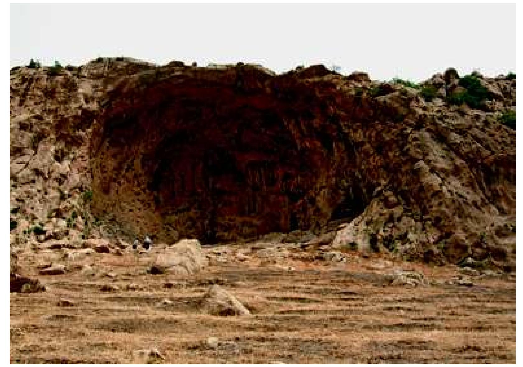 Fig. 30: Gunduk: Looking north at main cave, with cleft of spring just left of centre, and walled entrance to inner cave on right. Photograph: authors, June 2009 