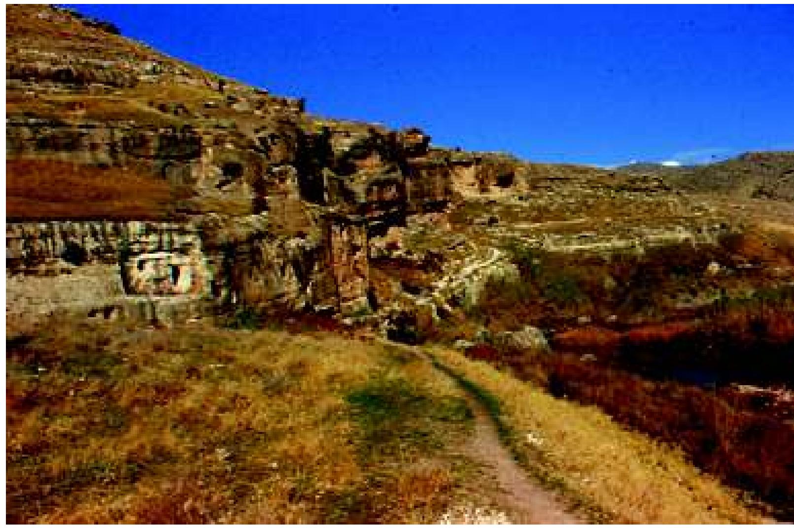 Fig. 40: Khanes: Looking north-east towards principal monuments, with Rider Relief on left, Large Panel at centre and River Gomel on right. Photograph: S. N. Shaw Reade, c. February 1973 