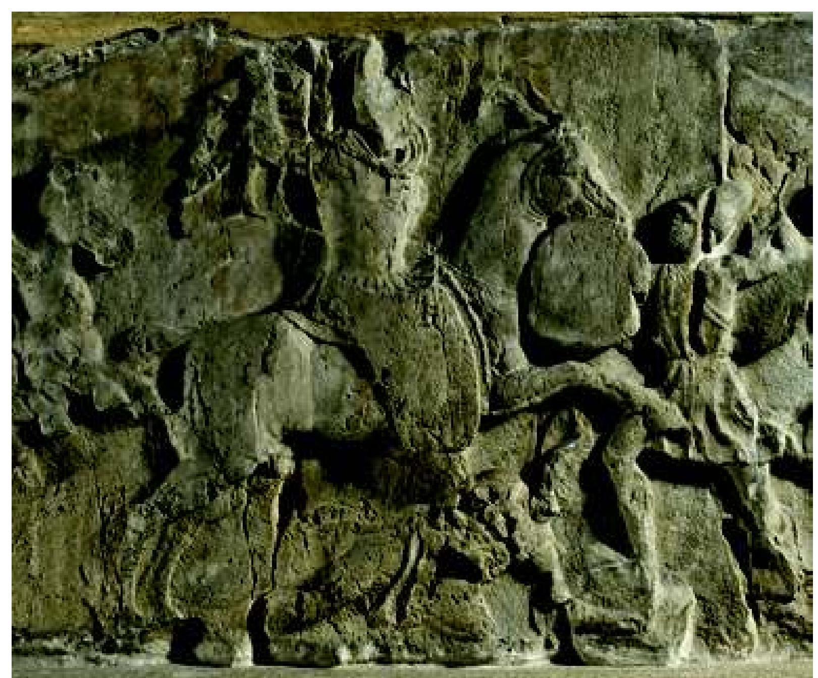 Fig. 65: Rider on frieze from tomb of Payava, Xanthos, c. 375-362 BC (GR 1848.1020.142). © Trustees of the British Museum  horseman, then Alexander would be much the best of sev- eral candidates who might have initiated alterations to the original Assyrian panel. Perhaps then the Rider Relief at hat stage looked a little like Fig. 66, in which we have in- serted a version of Alexander taken from the Pompeii mo- saic, but other candidates include Antiochus VII Sidetes, Tigranes II of Armenia whom Debevoise suggested, and several Parthian kings. Stone chippings that embody deci- sive evidence for the history of the sculpture may still be buried in the earth that fills Sennacherib’s canal in front of  cra   sisted an alternative preference for horses galloping at speed; then they were represented in the old-fashioned way with the hindlegs leaning forward together, as at Khanes. That was one of the factors that led Bachmann to regard the sculpture as Neo-Assyrian. There are horses galloping in this way on Lycian sculptures of the mid- fourth century BC (Fig. 65 and Cohen 1997, 34, Fig. 17); here the riders hold weapons in raised hands. Gallop- ing horses of the same kind appear on Roman coins of a ype introduced in 211 BC, during Rome’s First Macedo- nian War; the Dioscuri are shown charging with sarissa eveled (Fig. 60, lower right), much like the Parthian rider at Bisitun (Fig. 63) and most significantly like Alex- ander himself, as the helmeted bearded rider charging a Persian chariot who is painted on Apulian vases of c. 330 BC (Cohen 1997, 67, Fig. 41), in compositions intermediate between the simple Khanes scene and the elaborate mo- saic.  