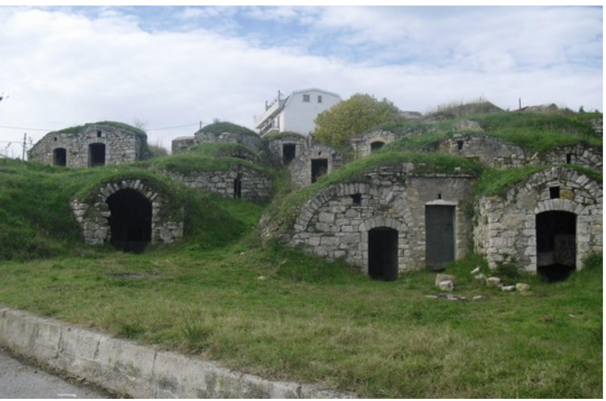 Fig. 8. The "palmenti" in the agrarian territory of Pietragalla, with the modern buildings on the background  3. Spanish "horreos" and "cabazos" 