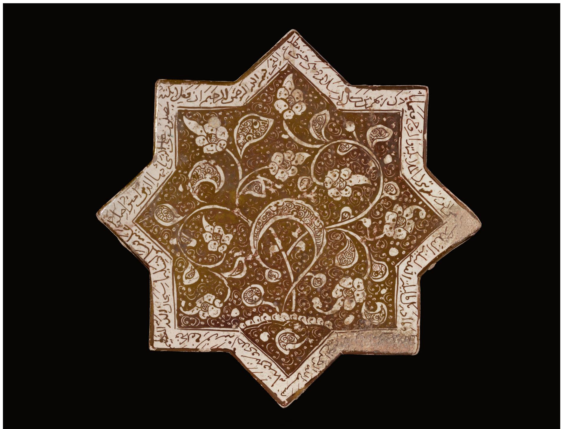 Fig, 1. Tile attributed to the Imamzada Yahya, Varamin, ca. 1260 CE. Molded fritware with luster glaze, 30.4 x 30.4 1.3 cm. British Museum, London, G.476. Photograph © The Trustees of the British Museum.  In both cases, the creation and installation of large-scale tile revetments raises questions such as: How were the tiles designed to fit buildings, and how were they transported from Kashan to their destinations? How does the stationary production of Kashan differ from the presumably itinerant one of the Masters of Tabriz? Overall, could an “IKEA model” with shipped pieces and written instructions work, or did an expert need to travel to the site to supervise installation? This article will pursue these questions, attending to design practices, collaborative labor, and the logistics of building sites. 