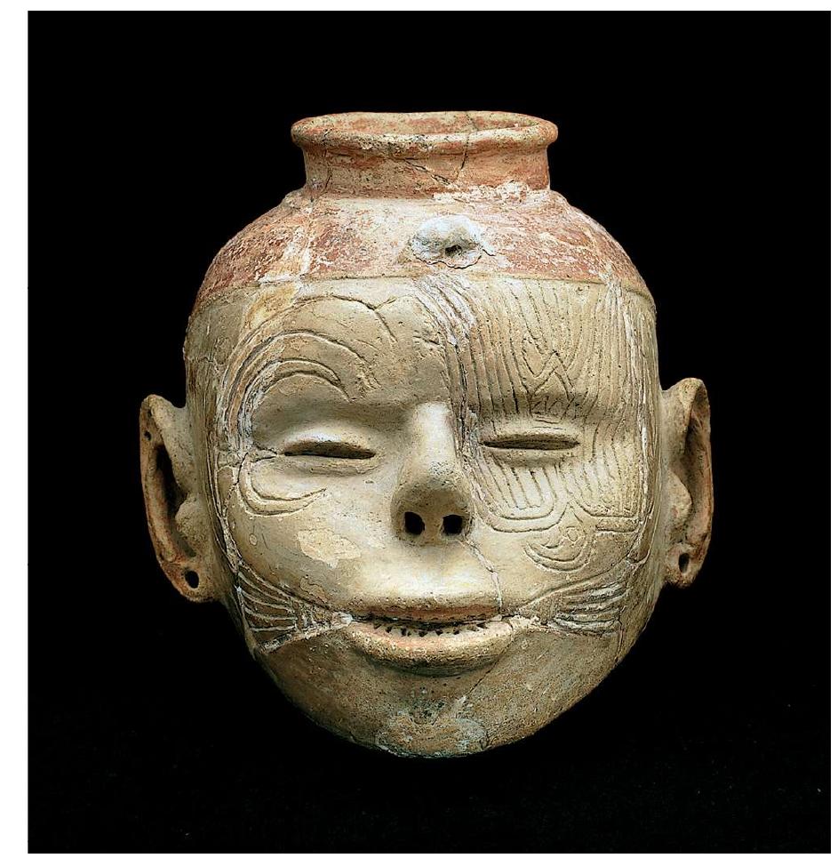 Figure 1. Facial tattooing on a late prehistoric ceramic effigy vessel from Arkansas (photo by David H. Dye)  on the faces and bodies of individuals depicted on rock art panels (Diaz-Granados 2004; Diaz-Granados & Duncan 2000), carved shell artefacts (Holmes 1880), and ceramic effigy vessels (Walker 2004) from throughout the region (Fig. 1). Although the specific antiquity of tattooing in North 