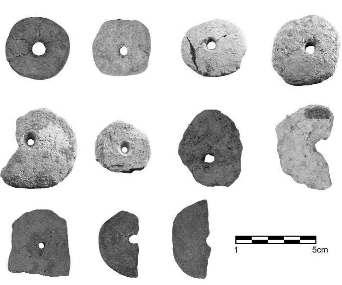 4 Proceedings of the 5th International Congress on the Archaeology of the Ancient Near East  Fig. 1: Late Neolithic pierced disks from Wadi Ziqlab. 
