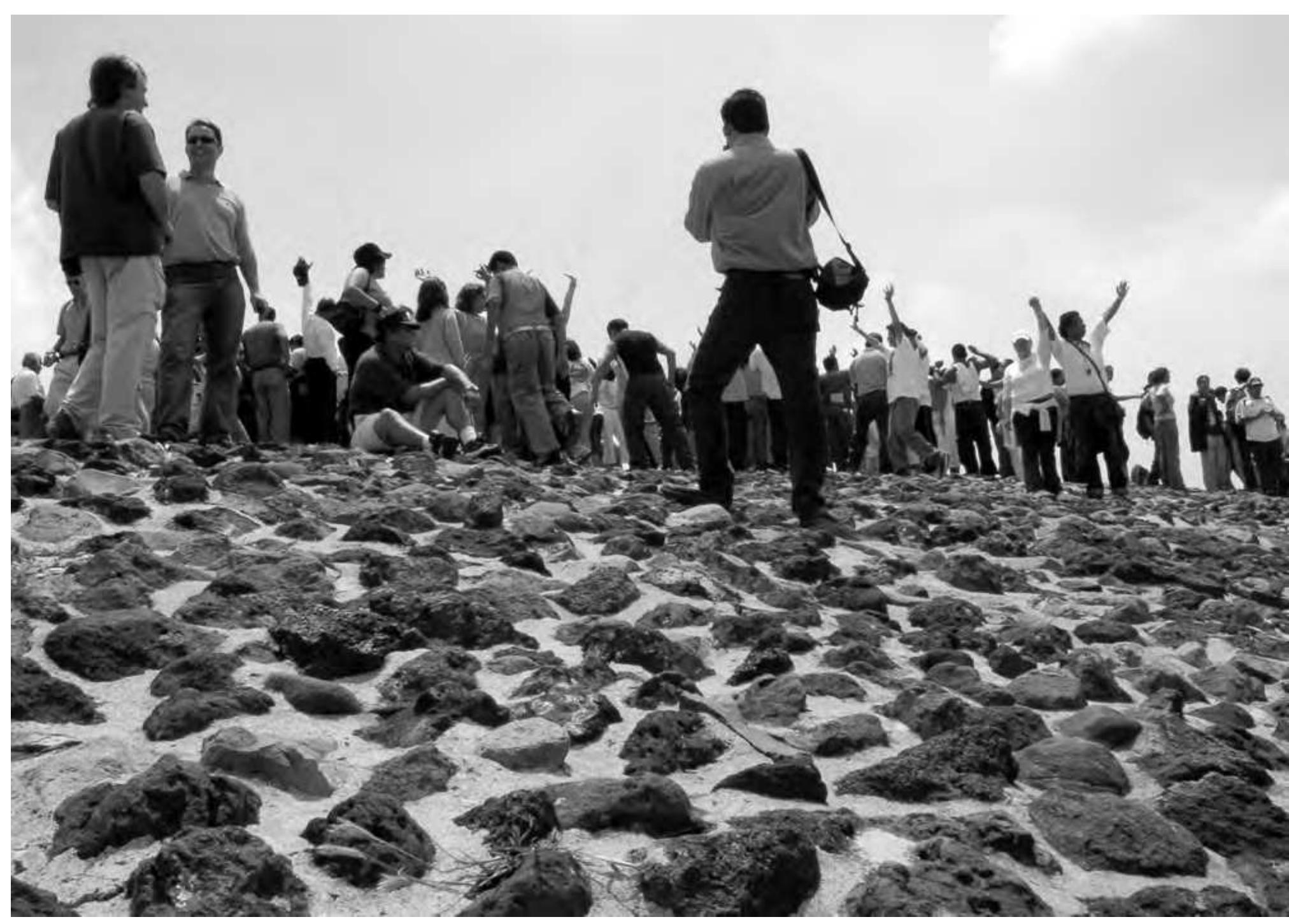 Figure 3.1: Collecting energy at the summit of the Pyramid of the Sun (Image: Webmoor). 