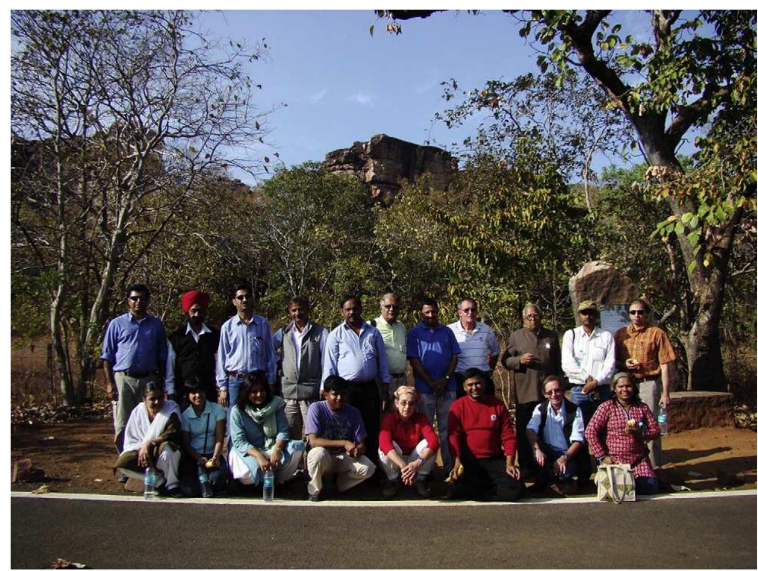 Fig. 3. Conference delegates on a field visit to the World Heritage site of Bhimbetka. Back row from left to right: P.R. Chauhan, V.S. Soni, R.K. Ganjoo, J.N. Pal, M.R. Rao, U.C. Chat- topadhyaya, A. Ajithprasad, M.A,J. Williams, V.D. Misra, R. Patnaik, V. Sathe. Front row from left to right: S.G. Deo, N. Agrawal, R. Jhaldiyal, M. Hazarika, C. Gaillard, S.D. Kaushik, R.W. Dennell, P. Verma. 