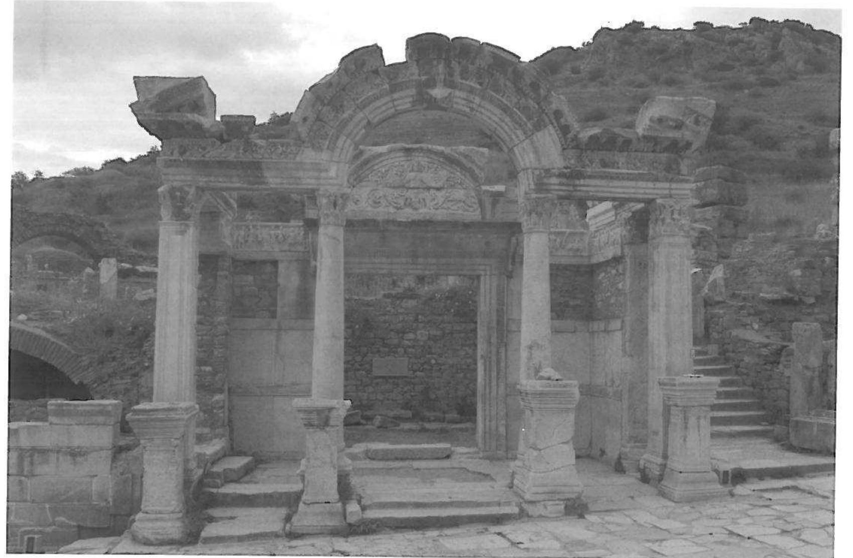 Fig. |. The “Temple of Hadrian” on Curetes Street (© OAT).  The building commonly known as the Temple of Hadrian is one the best-known buildings of Roman Ephesus (fig. 1), occupying a prominent location in the W section of Curetes Street (fig. 2), one of the chief thoroughfares of the Roman city. The street lies in the valley between the two hills that shape the urban layout, the Panayirdag to the north and the Bulbiildag to the south.' Discovered in 1956 and re-erected during the following two years, the “Temple of Hadrian” has never been systematically analyzed, and scholars have been unable to establish its chronology, function, and definitive reconstruction. A new project is underway at the Austrian Archaeological Institute to address these questions? and the present article presents preliminary results on the building phases and history of the structure.  