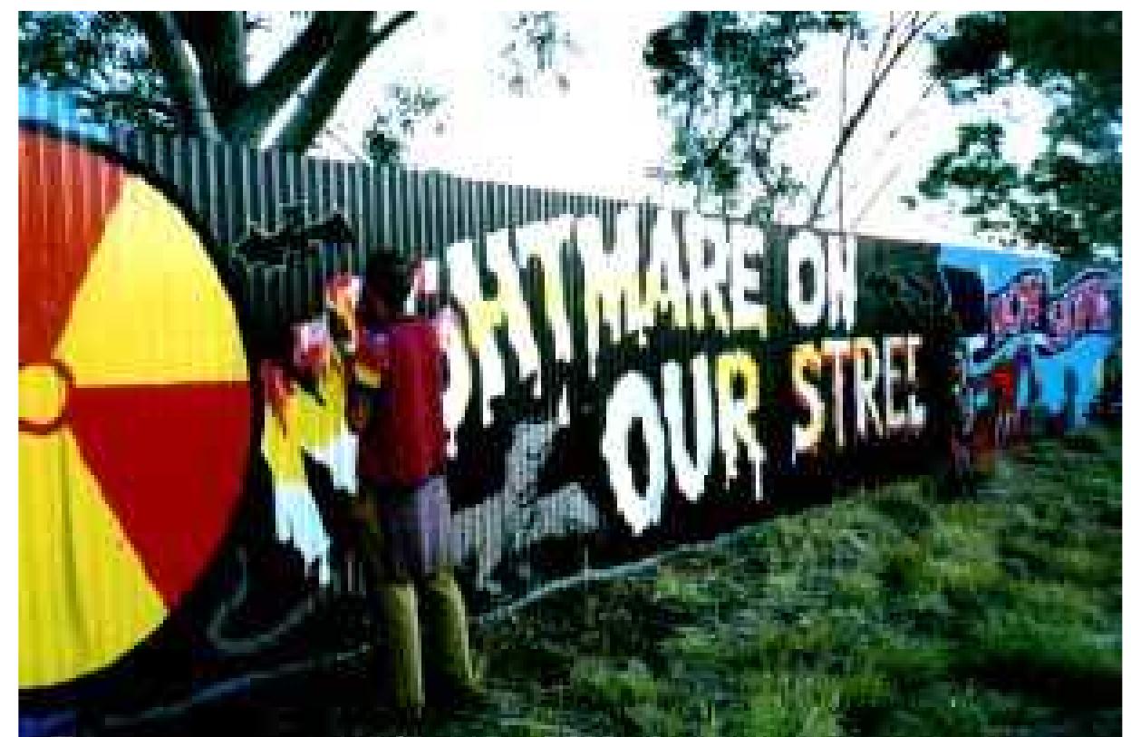 EARTHDREAM MUuRAL PROJECT, ALICE SPRINGS JULY 2000 fDranTH Deorep Croanars \ 8 kilometers laden with chai pots, records and cakes. We had known the UK’s free party ambassadors, Bedlam Sound System, were coming for Earthdream2000, but it was unbelievable just how motivated this crew were. Totally self- funded from party fundraisers in London, they rocked up with a whole shipping container full of sound system—decks, lights, and the whole party package. A mad free party in Byron Bay called Free NRG saw the crews meet all the Australian free party contingents. A beach event at Wooyong attracted about 1500 party crew despite police roadblocks—many had to walk 8 kilometers laden with chai pots, records and cakes.