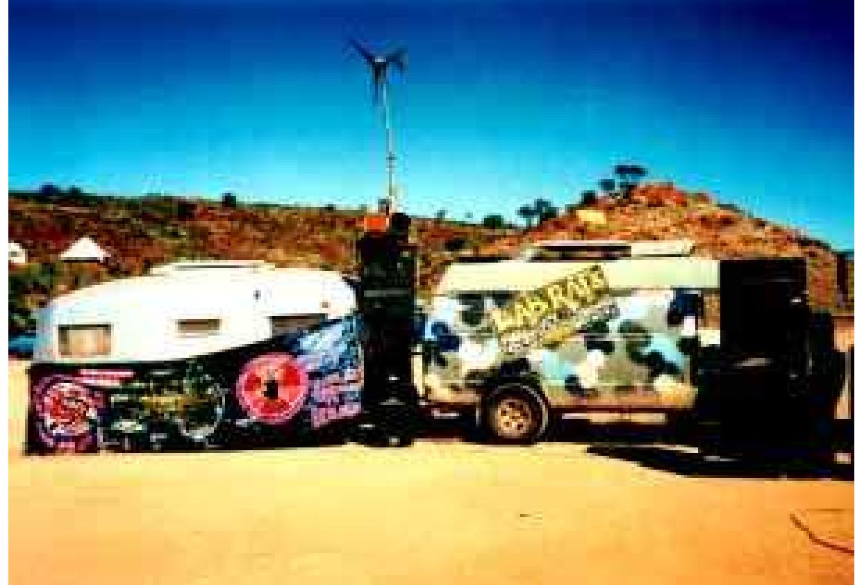 Laprats SOLA SOUND SYSTEM AT THE CLAYPAN ALICE SPRINGS, JUNE 2000 (Puoto. GRAHAM St Jonn) (babbling) Hmmm well the Labrats are me and Monkey Marc and anyone who will help carry a speaker, filter some veggie oil, play some funky tunes or freestyle some crazy rhymes on the solar powered sound system. Sometimes it might feel like you’re just a labrat in someone’s big god damn evil experiment and you think ‘fuck this, ’m taking control of my reality’ because the alternatives are there. And if we get off that apathetic brain numbing medication they feed you in the laboratory and use the waste of this society to create independence from all those things that are messing with the future of the planet, sort it out and have a rockin’ party while we’re doing it...why not!