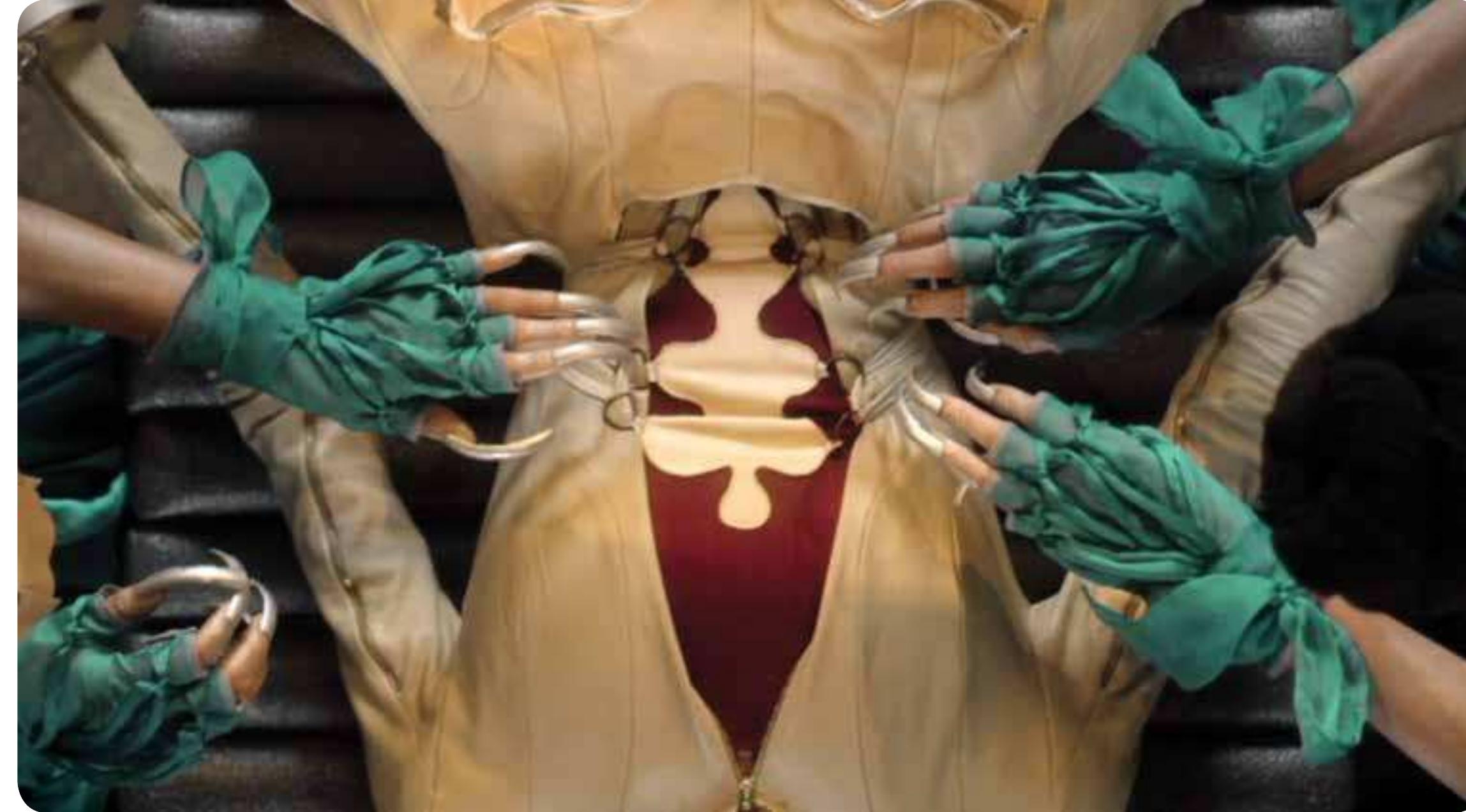 Jeana Theron, Anatomy of fashion, 2011, digital still  it is usually integrated with text and music."® If a single image is capable of preceding abjection and the punctum, as Kristeva and Barthes suggest, then surely the combination of images, sound, and text, as well as the level at which humanity is exposed to media could inevitably lead to instances of abjection in response to the punctum.  ind wounding in the film, however the visual mpact of the surgeon's reassuring touch elicits he aura of a cathartic eviceration. As volumous ed silk fabric pulses from the open wound, the Jual reaction of repulsion and disgust, described yy Kristeva as a vortex that maintains the border etween life and death, chaos and order, may 2merge in the viewer, equating abjection to  he horror of the unrepresentable. However, ollowing a poignant silence, the constricted nodel takes a deap life giving breath, as shekinah light radiates through a pulsating heart, ike fire, in orange and yellow hues. According  o Jewish mythology this light personifies the eminine attributes of God's presence, physically nanifesting in the time space continuum, suggesting restoration, consistent with Ettinger’s \otion of the matrixial borderspace. The frame slowly rotates to a vertical position suggestive  »f the resurrection, emphasising the viewer's ecognition of death and the mystery of esurrection as the punctum of this film.  ‘hus, Theron’s film evidences the dichotomies etween Kristeva’s abject and Ettinger’s matrixial ntersecting in the instance of Barthes’s notion  of the punctum. Its vivid nature and use of magery make it an ideal study in the intricacies )f the very real concepts of the abject and the natrix. Finally, given the complex nature of these oncepts and their practical applications in art, as vell as the lack of academic attention devoted  o fashion film, perhaps a more thorough »xploration in the form of a full-length study is varranted. 