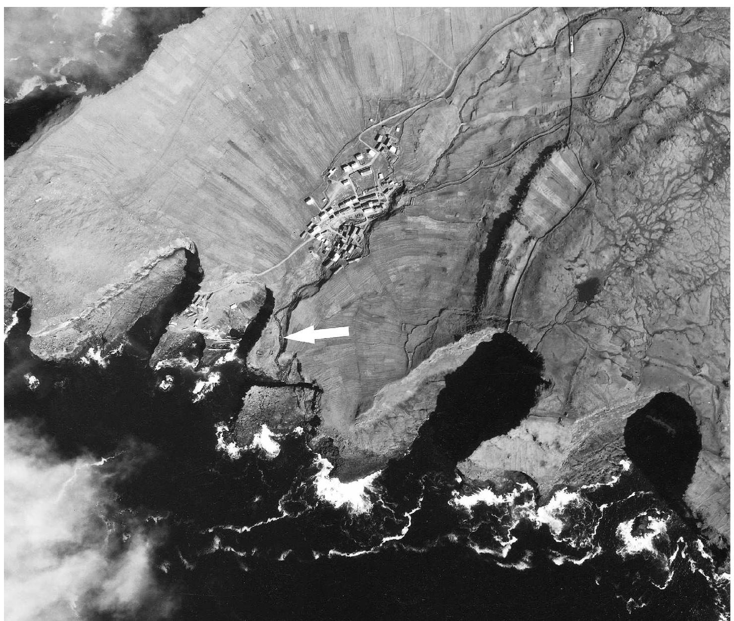 Figure 5. Aerial photograph of church site at Mykines on the island of Mykines. Photo: Faroese Cadastral Office (Matrikulstovan) 1958. 