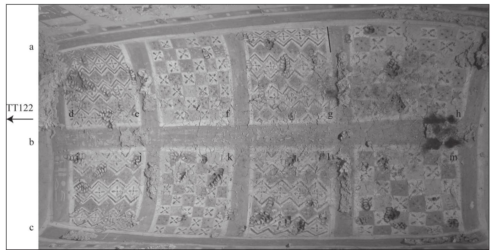 Fig. 10: TT122, Third Chapel, ceiling inscriptions. (Author’s photo)  registers of couples being purified by a priest, presumably a son (PM(7)II; Fig. 9). In both cases there is significant destruction to the upper bodies of the figures, and all inscriptions pertaining to the couple in the bottom register are lost, largely due to the TT58 breach. The top register fared somewhat better. Above the priest are four col- umns of text, and while hieroglyphs were certainly sketched, the traces were not enough to give a clear reading. Most of the inscription above the couple is lost, but in the last three columns part of the wife’s name and titles are extant, indicating that Amunemhat and Nesy are depicted here.4” 
