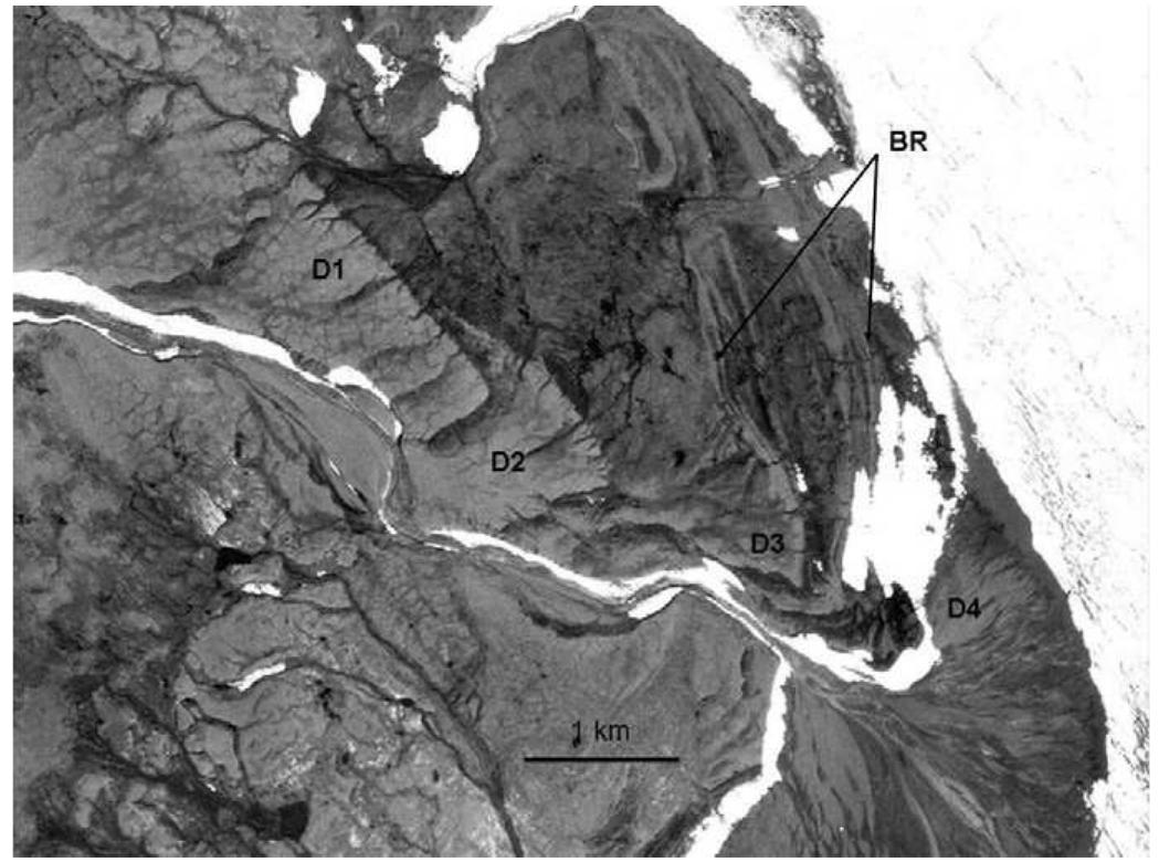 Aerial photo of wave-generated beach ridges (br) at kap ole