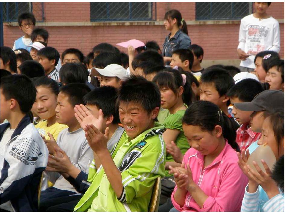 Photol. Pupils watching performance, taken in the beginning of Jie’s fieldwork.  Photo 2. A pupil’s homework, taken in the second month. 