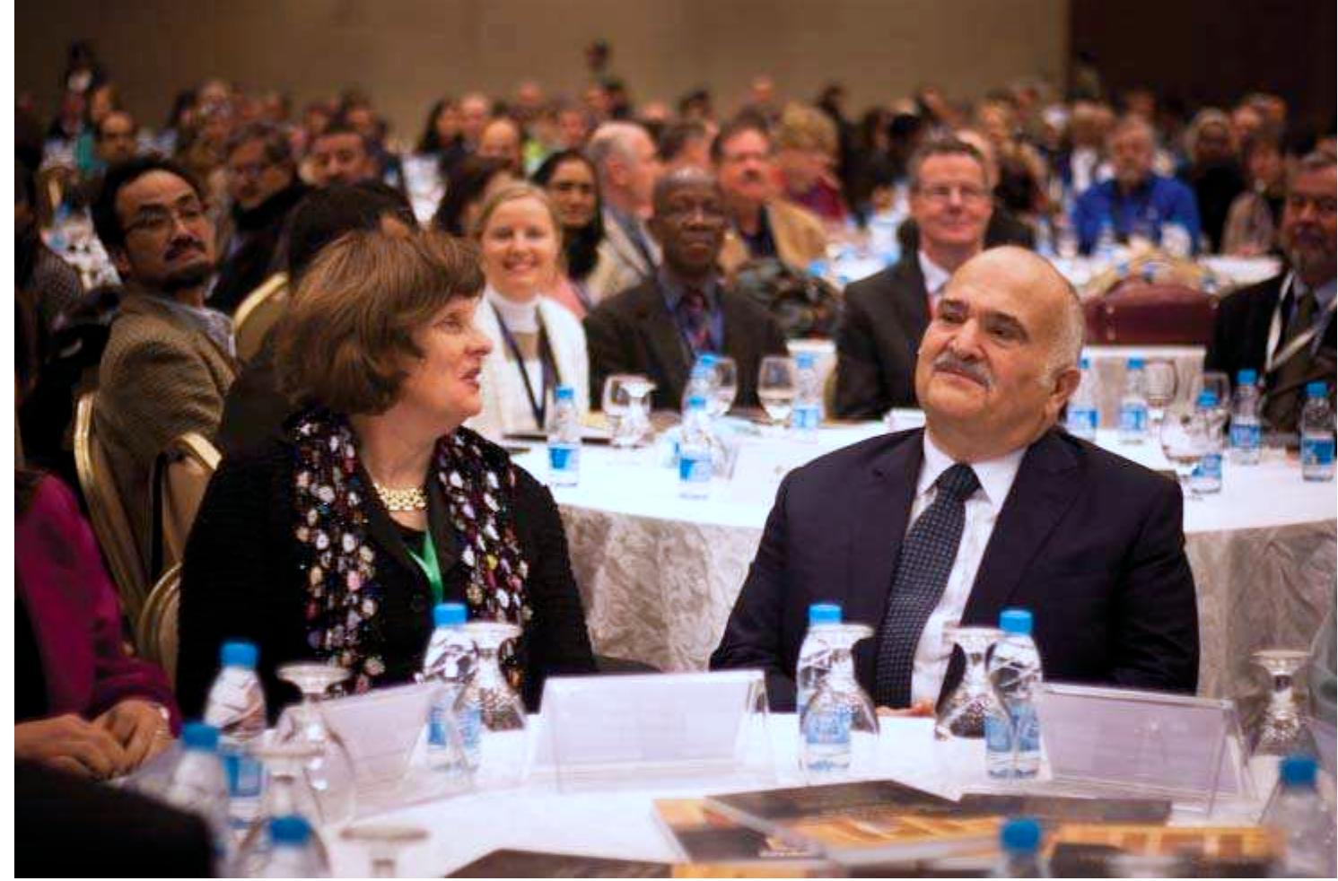 FIGURE 2 Prof. Claire Smith, WAC president, and HRH President Hassan Bin Tal. © Ele Jenkins  CuUuliluidl HILT Ilda Se ddA SUIICIL do PEEEELA fecre JUotlitiealtOll OL ils tUellilllary \i ls: a). The same slippery slope of organizational choices needs to be parsed when assess- ing WAC’s economic impact to Jordan. Several considerations need to be made. Firstly, the choice of venue for the conference ultimately determines how beneficially impactful to the local economy a conference is. According to Grado et al. (1997), up to 76.9 per cent of non-resident expenditures can be expected to be spent on food, lodging, and travel, that is, conference attendees tend to spend the majority of their money primarily at conference venues. WAC-7 chose to stage this large-scale quad- rennial event at the isolated and remote Hilton King Hussein Bin Talal Convention Centre (Fig. 3). Since WAC organized nearly every detail of each participant’s itiner- ary — from airport pickups to extracurricular leisure tour trips and hotel bookings at the Dead Sea resort area and the town of Madaba — participant expenditures went primarily to the Hilton corporation and WAC itself. WAC’s tight organizational con- trol exerted only served to limit the potential for off-site financial benefits to everyday  